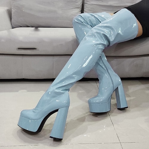 Sexy blaue Plateaustiefel mit Leopardenmuster und klobigem Absatz für Damen – auffälliges Schuhwerk für Partys, Events und Abende Image