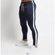 Herren Jogginghose Trainingshose Jogginghose Jogger Kordelzug Seitentaschen Einfarbig Atmungsaktiv Feuchtigkeitsableitung Sportlich Athlässigkeit Fitnessstudio Casual / sportlich Schwarz Rote