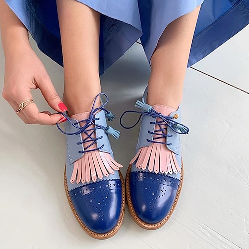 Schwarze und goldene Oxford-Schuhe für Damen – Brogues mit Schnürung, Flügelkappe, Fransen und Quaste für den lässigen Vintage-Stil Image