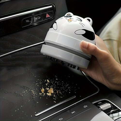 kompakt Niedlicher Tischstaubsauger, der Staub aufräumt Chaos in engen Räumen. USB-Ladestaubsauger für den Schreibtisch Image