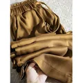 Pantaloni a gamba larga di alta qualità da donna pantaloni Vintage in raso di seta a vita alta con