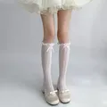 Lolita ragazze calze lunghe calze da donna calze a rete in pizzo Sexy calze a rete calze con volant