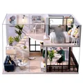 CUTEBEE Casa delle bambole fai da te Case delle bambole in legno Kit di mobili per casa delle bambole in miniatura Casa Musica Giocattoli a led per bambini Regalo di compleanno L32