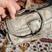 Coach Bags | Coach Wristlet Silver/Grey Euc | Color: Gray/Silver | Size: 7-1/2" X 4-1/2" X 1-1/2"