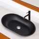 Living And Home Oval Counter Mounted Bathroom Counter Top Basin Matte Black W 570 mm X D 360mm