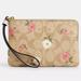 Coach Bags | Coach Corner Zip Wristlet In Signature Canvas With Floral Print | Color: Cream/Pink | Size: Os