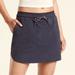 Athleta Skirts | Athleta Trekkie Crest Skort Mesh Black 8 | Color: Black | Size: 8