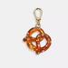 Coach Jewelry | Coach Pave Crystal Pretzel Charm Nwt | Color: Brown | Size: Os