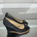 Coach Shoes | Coach Black Canvas Logo Signature Canvas Wedge Heels Shoes 8 Sandals Peep Toe | Color: Black/Silver | Size: 8