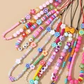 Bracelet de téléphone portable en perles acryliques colorées pour femmes et filles sangle de