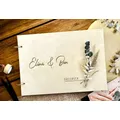 Elegant guest book made of wood for the wedding photo album with dried flowers photo book