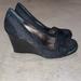 Coach Shoes | Coach Black Nela Wedge Canvas Suede Penny Loafer Heels Size 7.5b | Color: Black | Size: 7.5