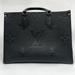 Louis Vuitton Bags | Authentic Louis Vuitton Handbag Pre Owned On The Go Mm Black | Color: Black | Size: Os