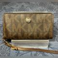 Michael Kors Bags | Michael Kors Cell Phone Wallet Snap Closure. Color Brown Size 6” X 3 1/2” | Color: Brown/Gold | Size: 6” X 3 1/2”