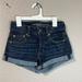 American Eagle Outfitters Shorts | Dark Blue Jean American Eagle Short Stretchy Shorts | Color: Blue | Size: 00