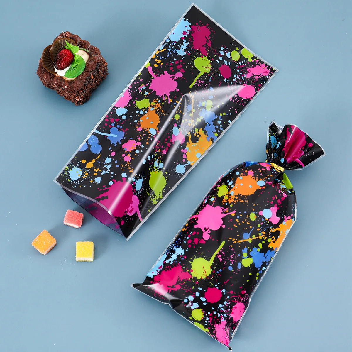 25/50pcs fluor zierende themen orientierte Kunst Graffiti Süßigkeiten Tasche Geschenk verpackung Tasche glühen Geburtstags feier liefert Hochzeit Baby party Geschenkt üte Image