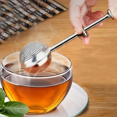 Infuseur à thé en acier inoxydable avec longue poignée et passoire à maille fine théière