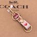 Coach Accessories | Coach Trigger Snap Bag Charm With Stripe Heart Print Leather Keychain | Color: Pink/White | Size: 3/4" (L) 2 1/2" (H)