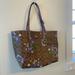 Coach Bags | Coach Nwt - Reversible City Tote Lily Print | Color: Purple/Tan | Size: Os