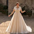 Robes de mariée classiques grande taille col en V manches courtes quoi que ce soit balayage