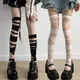 Chaussettes Hautes Gothiques Noires et Blanches pour Femme Bas Sexy en Dentelle Style Japonais