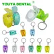 50pcs Tooth-Shaped Dental Floss Keychain Teeth Floss Roll Key Chain Portable Tooth Cleaning Line Gum