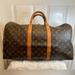 Louis Vuitton Bags | Louis Vuitton 50 Monogram Keepall 50 Duffle. | Color: Brown/Gold | Size: 19.7” By 11.4” X 8.7”