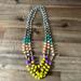 Anthropologie Jewelry | Anthropologie Women's Peach/Yellow/Turquoise/Purple 3-Strand Beaded Necklace | Color: Blue/Yellow | Size: Os