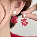 Boucles d'oreilles de style chinois avec perle rouge coupe-papier clous d'oreille de dragon