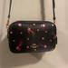 Coach Bags | Coach Jes Crossbody With Disco Star Print Bag | Color: Black/Pink | Size: Os