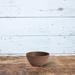Latitude Run® Pollyanna Self-Watering Artstone Pot Planter Resin/Plastic/Stone in Brown | 4.75 H x 10 W x 10 D in | Wayfair