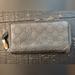 Gucci Bags | Gucci Bamboo Tassel Ssima Gg Logo Leather Zip Around Long Wallet | Color: Gray | Size: Os