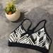 Nike Intimates & Sleepwear | Nike Dri-Fit Indy Sport Bra Cross Back Small , Black And White Color | Color: Black/White | Size: M