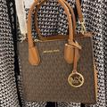 Michael Kors Bags | Michael Kors Mercer Medium Pebbled Leather Crossbody Bag | Color: Brown/Gold | Size: Medium