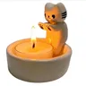 Usa la decorazione della casa del candeliere del gattino del fumetto come mostrato nella foto