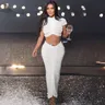 Kim Kardashian abito a due pezzi in maglia bianca trasparente elegante maglione trasparente Crop Top