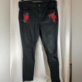 American Eagle Outfitters Jeans | American Eagle Outfitters Super Stretch Jegging Black Roses On Pockets Size 18 | Color: Black/Red | Size: 18