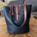 Dooney & Bourke Bags | Dooney & Bourke Vintage Large Bucket Bag Warm Cedar Black All Weather Le | Color: Black/Brown | Size: In Description