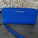 Michael Kors Bags | Indigo Blue Zippy Wallet. New Without Tags. | Color: Blue | Size: Os