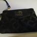 Coach Bags | Coach Black Signature C Small Wristlet, Leather Tag Logo Top Zipper And Handle | Color: Black/Silver | Size: Os