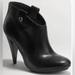 Coach Shoes | Coach Aliza Black Leather Metal Logo Side Tabs Heeled Almond Toe Booties Size 7b | Color: Black | Size: 7