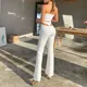 Pantalon évasé blanc évidé pour femme taille haute triangle au dos sexy pantalon à jambes larges