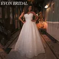 Evon Bridal luxe Glitter tulle robe de mariée plus taille douce sans manches robe de mariée a -