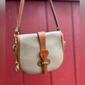 Dooney & Bourke Bags | Dooney & Bourke All Weather Leather Vintage Crossbody Bag In Taupe Flap Over | Color: Brown/Tan | Size: Os