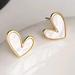 Anthropologie Jewelry | Mini White Hearts With Gold Accent Stud Posts | Color: Gold/White | Size: Os
