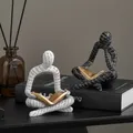 Persone che leggono figurine Decorative di arte astratta moderno semplice mobile TV armadietto del