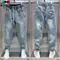 Moda coreana Streetwear marchio di lusso da uomo con coulisse Casual Jeans larghi in Denim per la