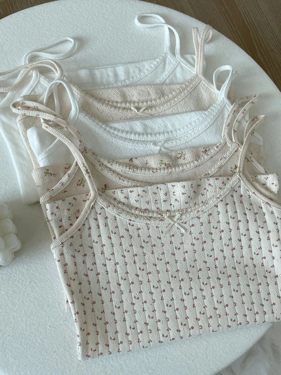 Top corto in cotone con fiocco floreale con occhielli Top estivo in pizzo senza maniche Canotta sottile da donna Stile preppy Dolce canotta Y2k Abbigliamento