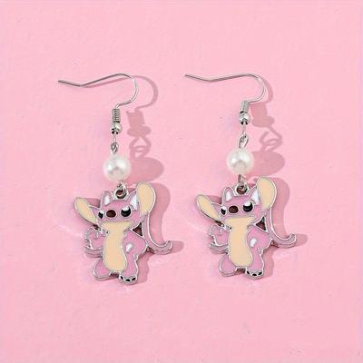 Angelic Stitch And Angelic Couple Earrings, A Cart...