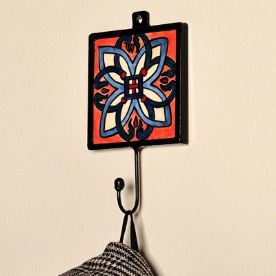 'Handcrafted Floral-Inspired Red and Blue Ceramic Coat Hanger'